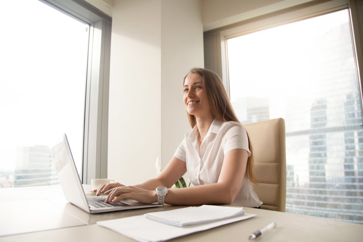 young-female-entrepreneur-feels-happy-workplace